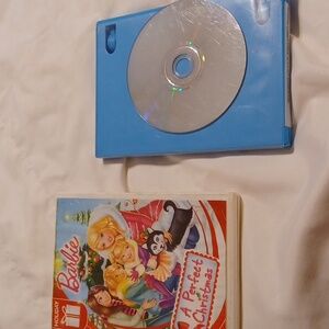 2 Christmas dvds barbie and Rudolph